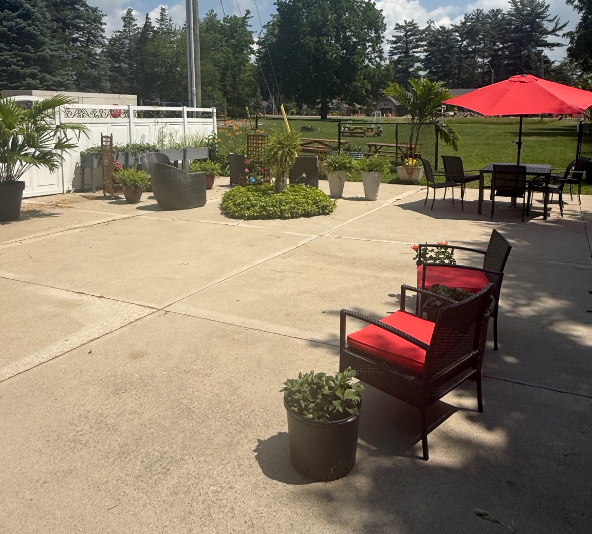 Outdoor patio seating at the Delhi facility